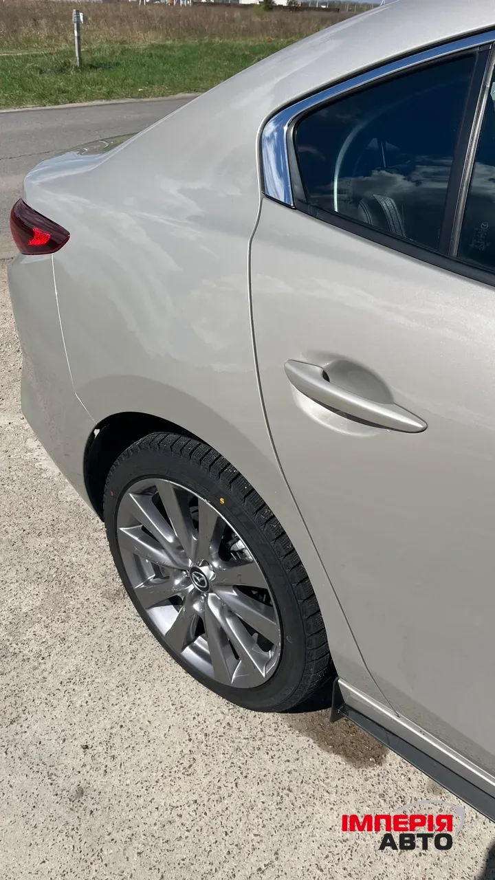 Mazda 3 - фото 25