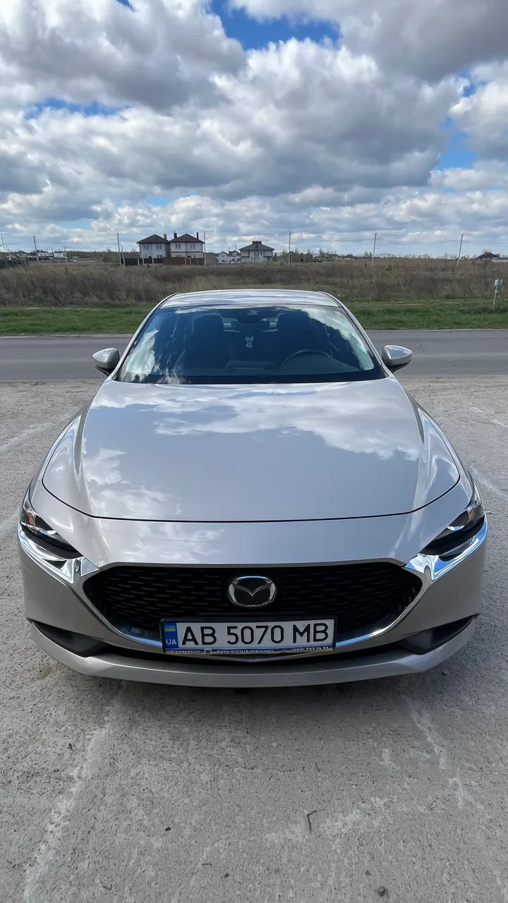 Mazda 3 - фото 2