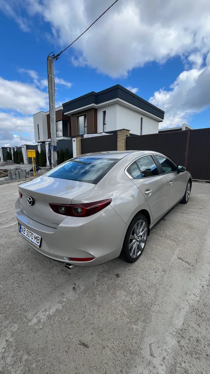 Mazda 3 - фото 7