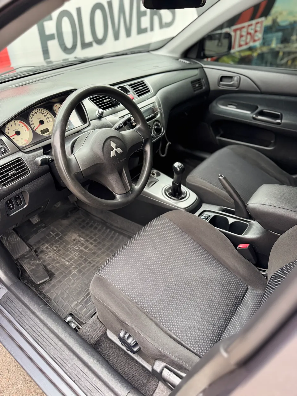 Mitsubishi Lancer - фото 8