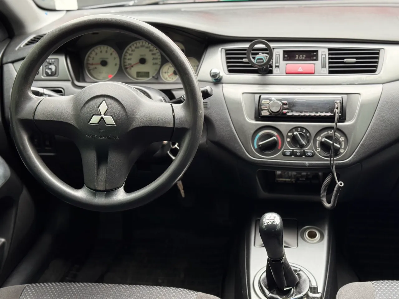 Mitsubishi Lancer - фото 11