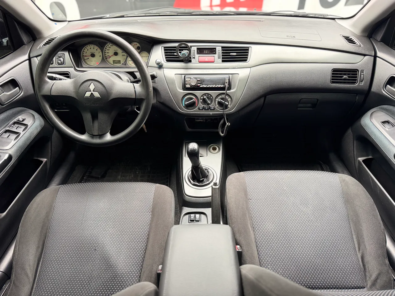 Mitsubishi Lancer - фото 10