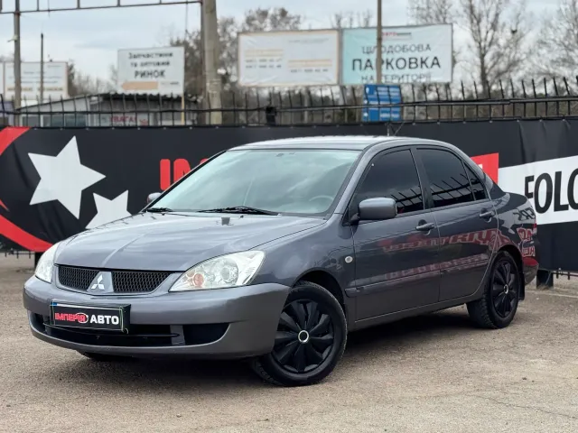 Mitsubishi Lancer - фото 1