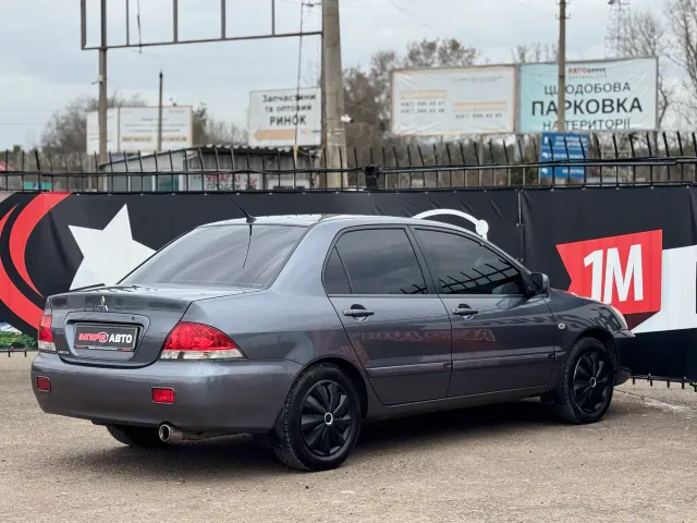 Mitsubishi Lancer - фото 5