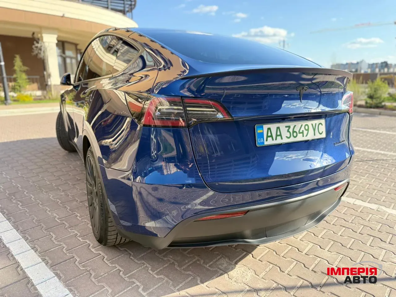 Tesla Model Y - фото 11