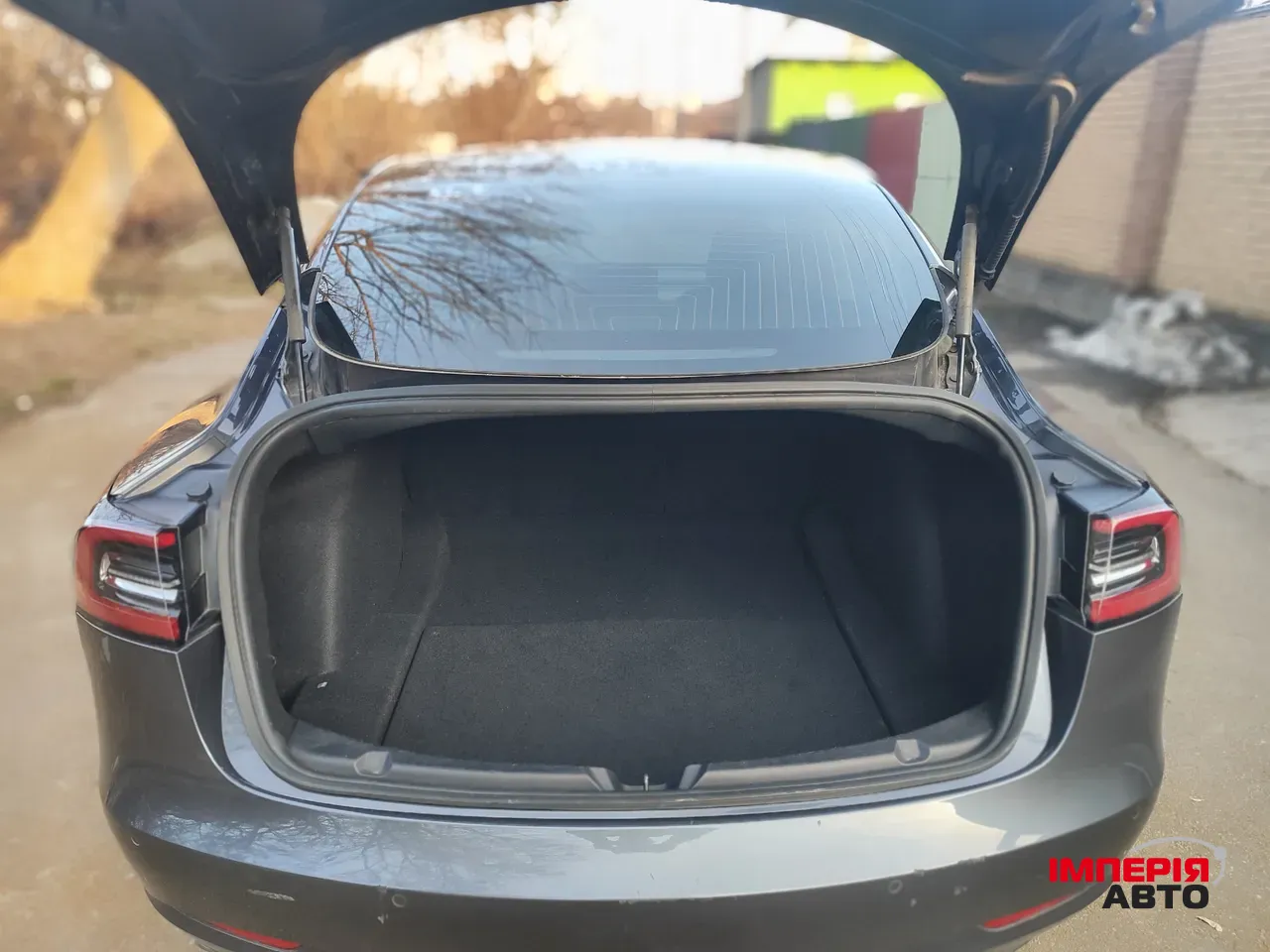 Tesla Model 3 - фото 11