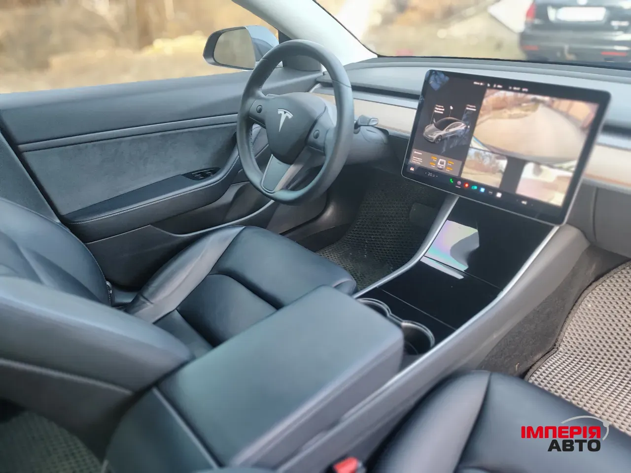 Tesla Model 3 - фото 13