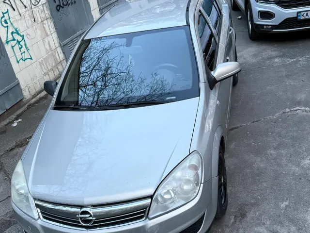 Opel Astra - фото 1
