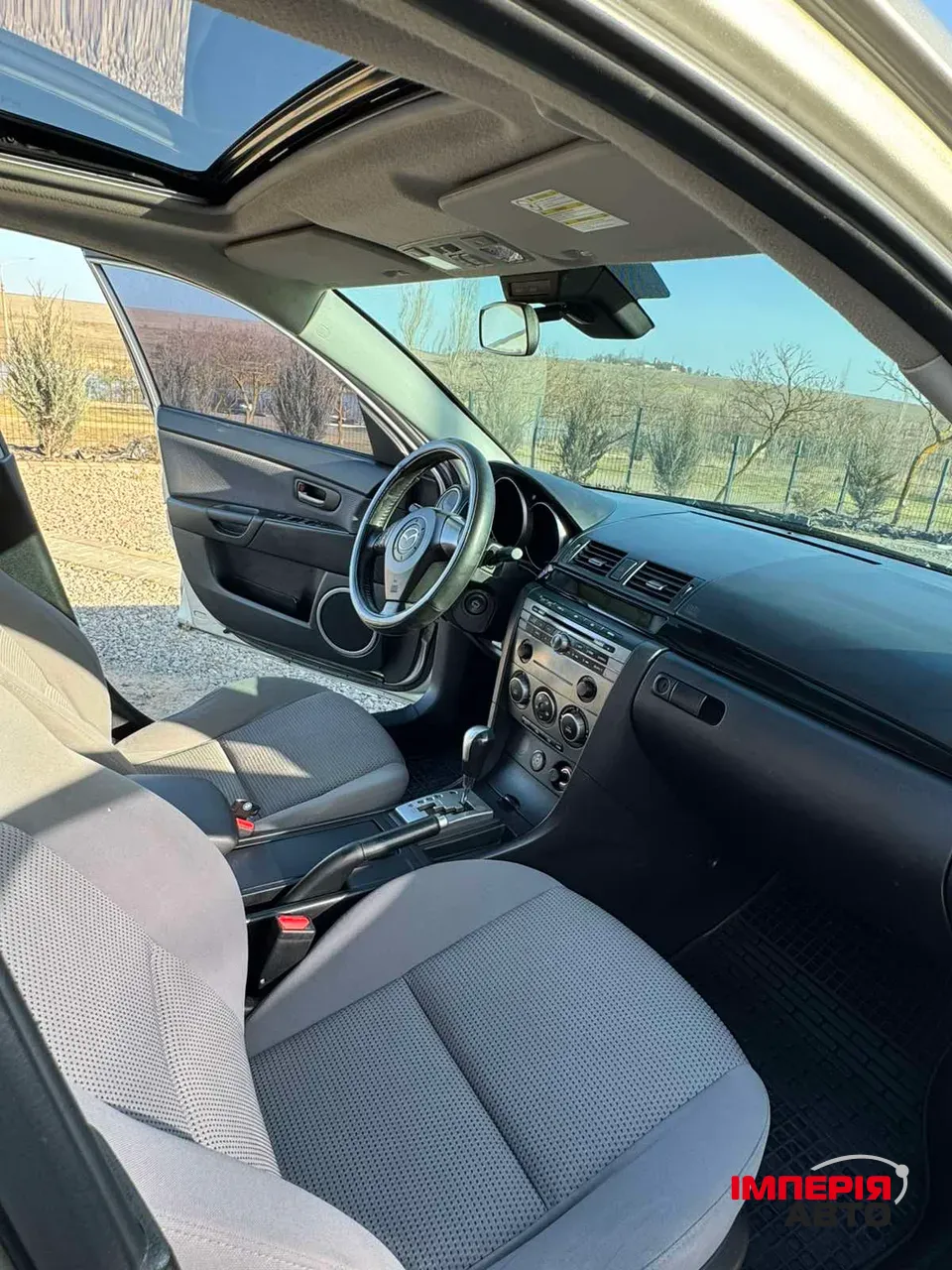 Mazda 3 - фото 4