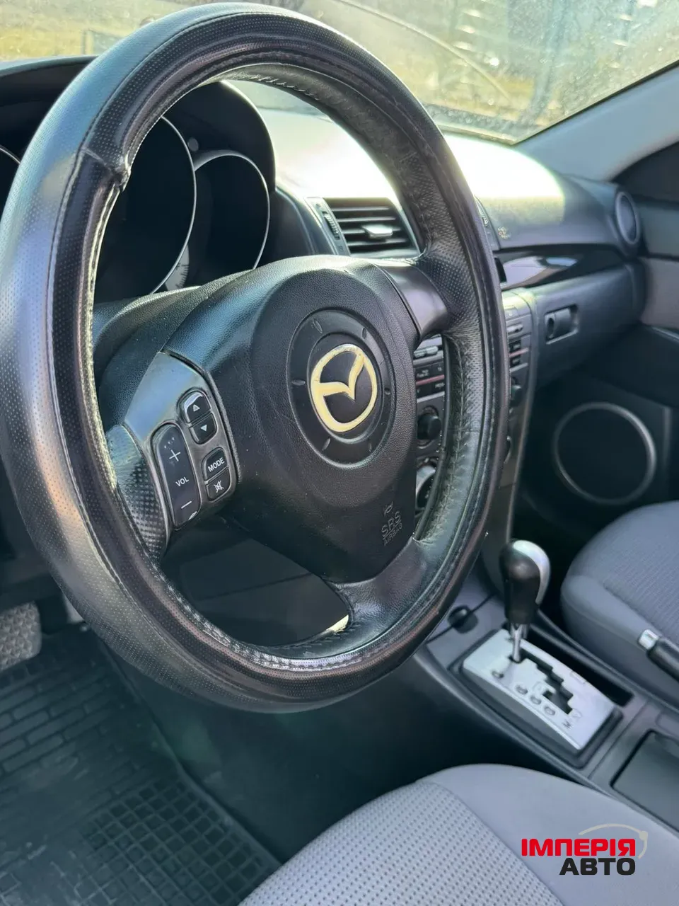 Mazda 3 - фото 7