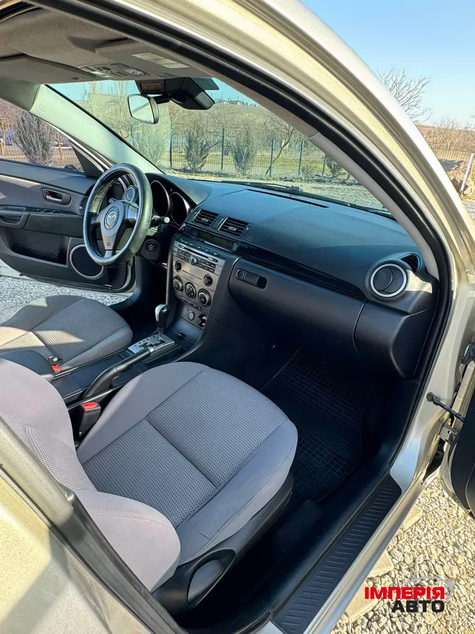 Mazda 3 - фото 8