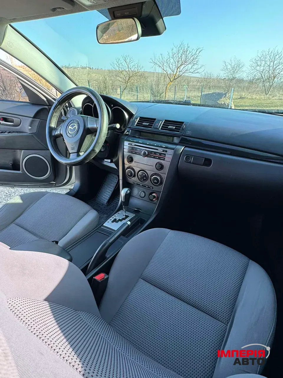 Mazda 3 - фото 16