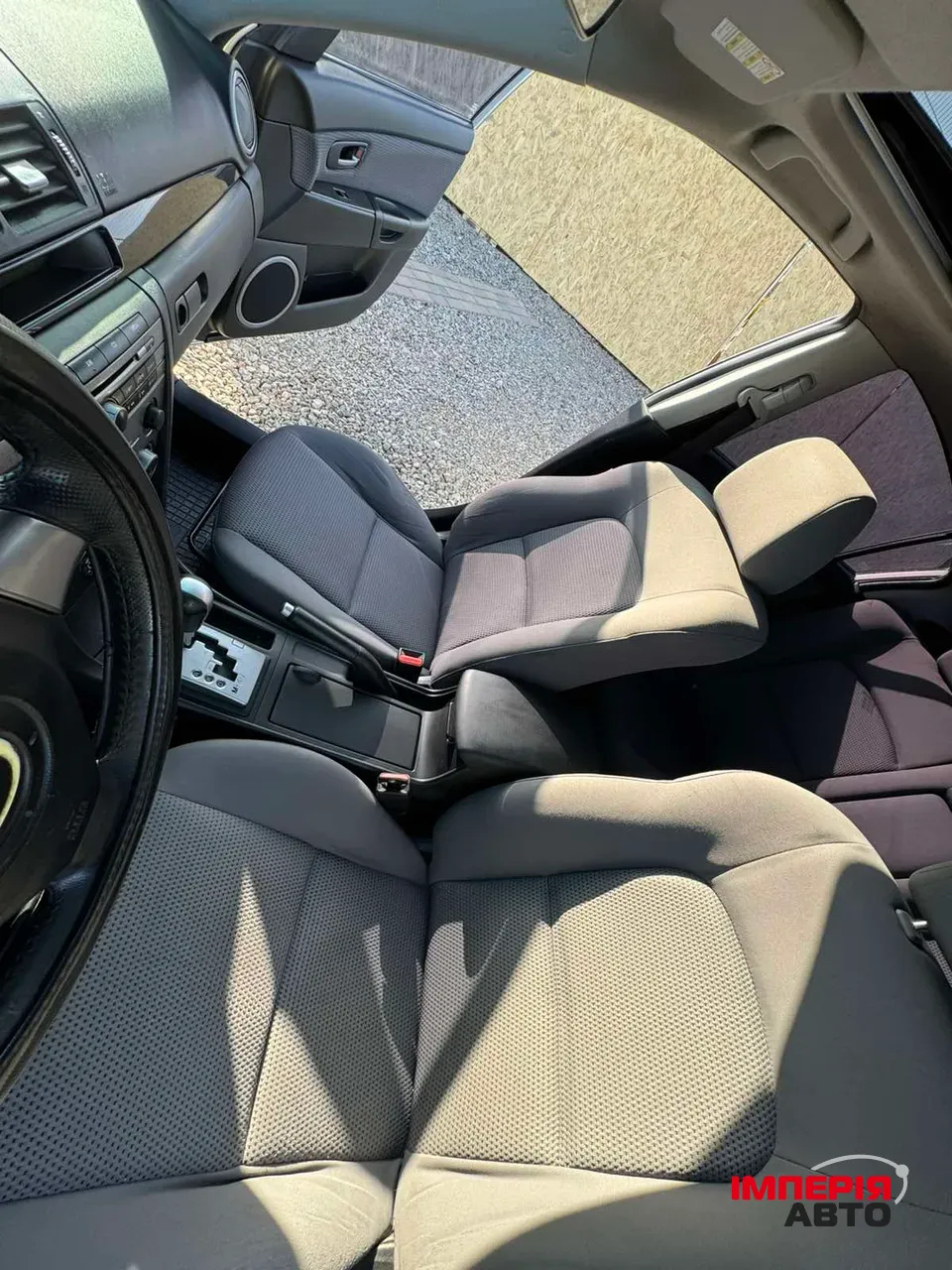 Mazda 3 - фото 11