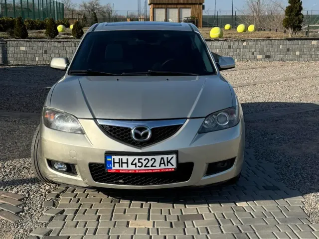 Mazda 3 - фото 1