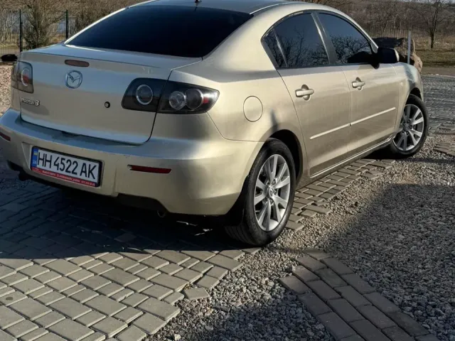 Mazda 3 - фото 3