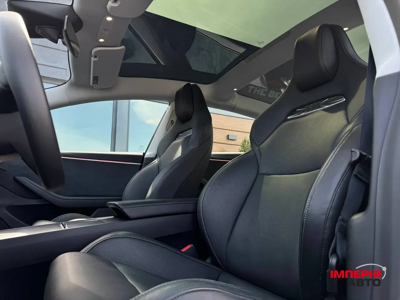 Tesla Model 3 - фото 32