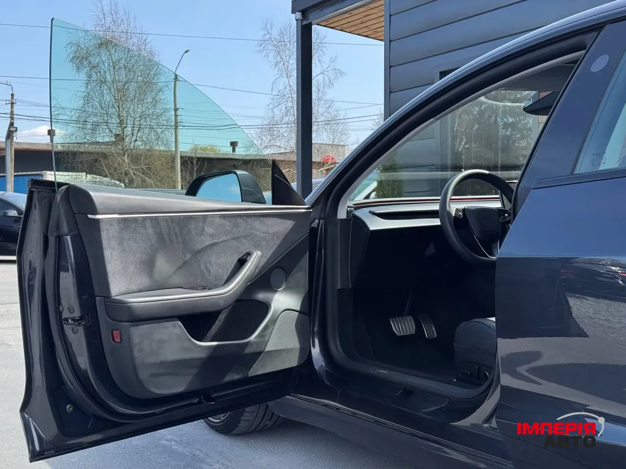 Tesla Model 3 - фото 26