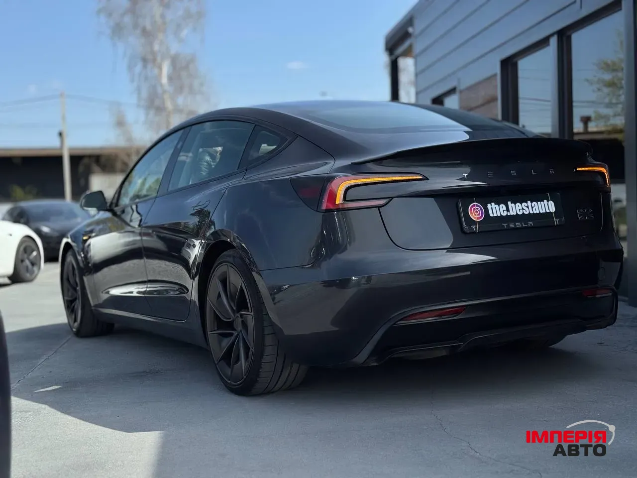 Tesla Model 3 - фото 8