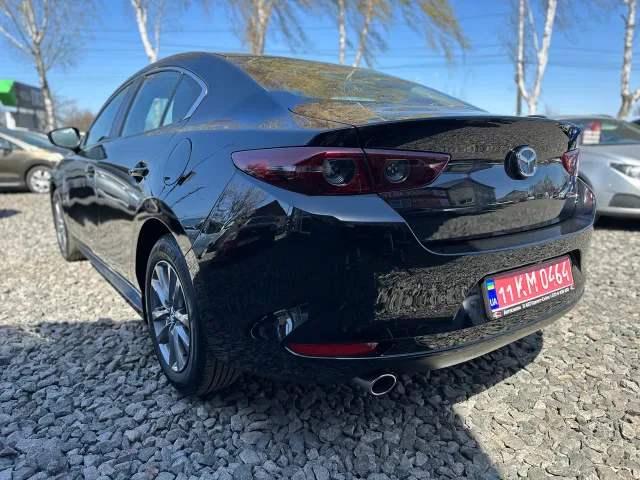 Mazda 3 - фото 4