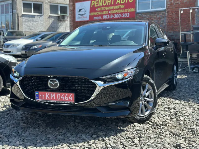 Mazda 3 - фото 2