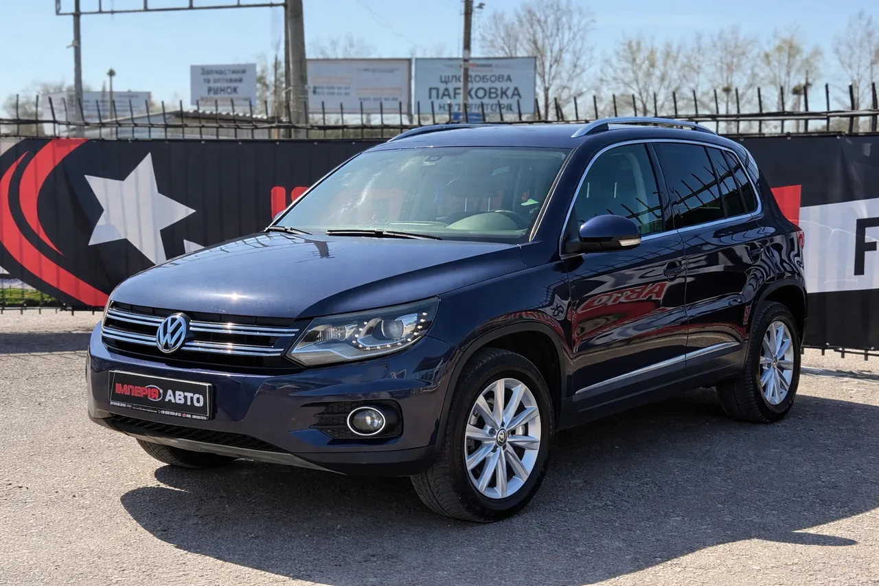Volkswagen Tiguan - фото 1