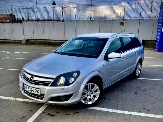 Opel Astra - фото 1