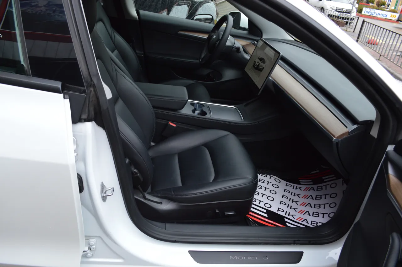 Tesla Model 3 - фото 35