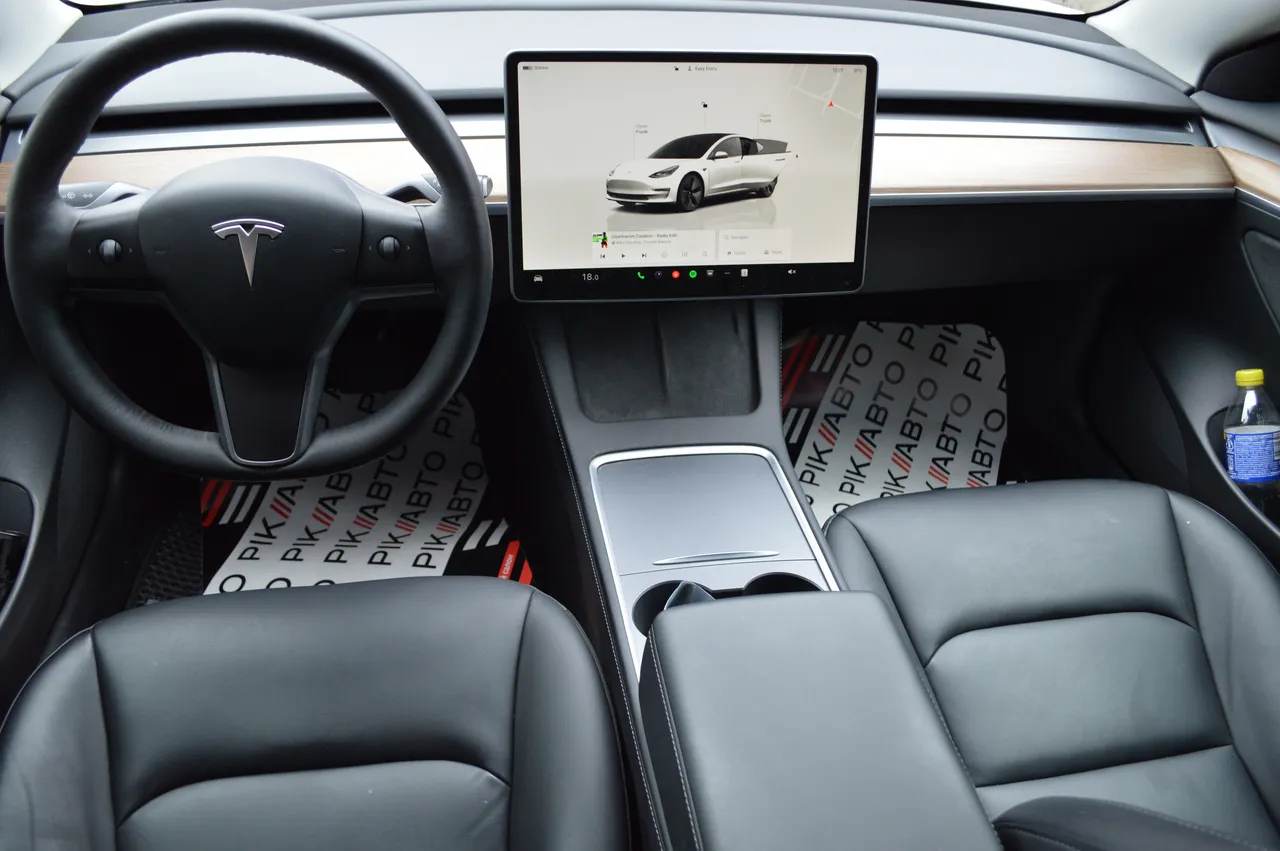 Tesla Model 3 - фото 28