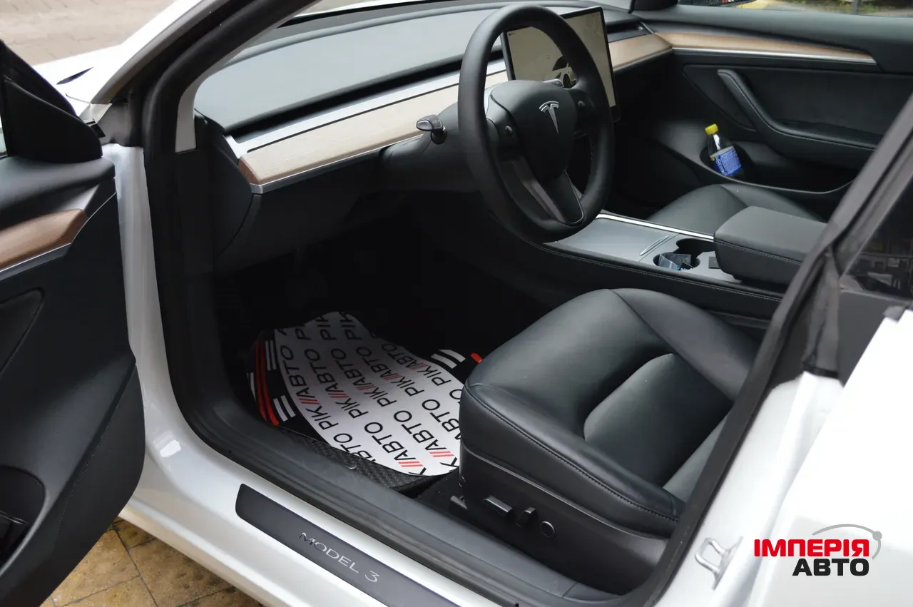 Tesla Model 3 - фото 12