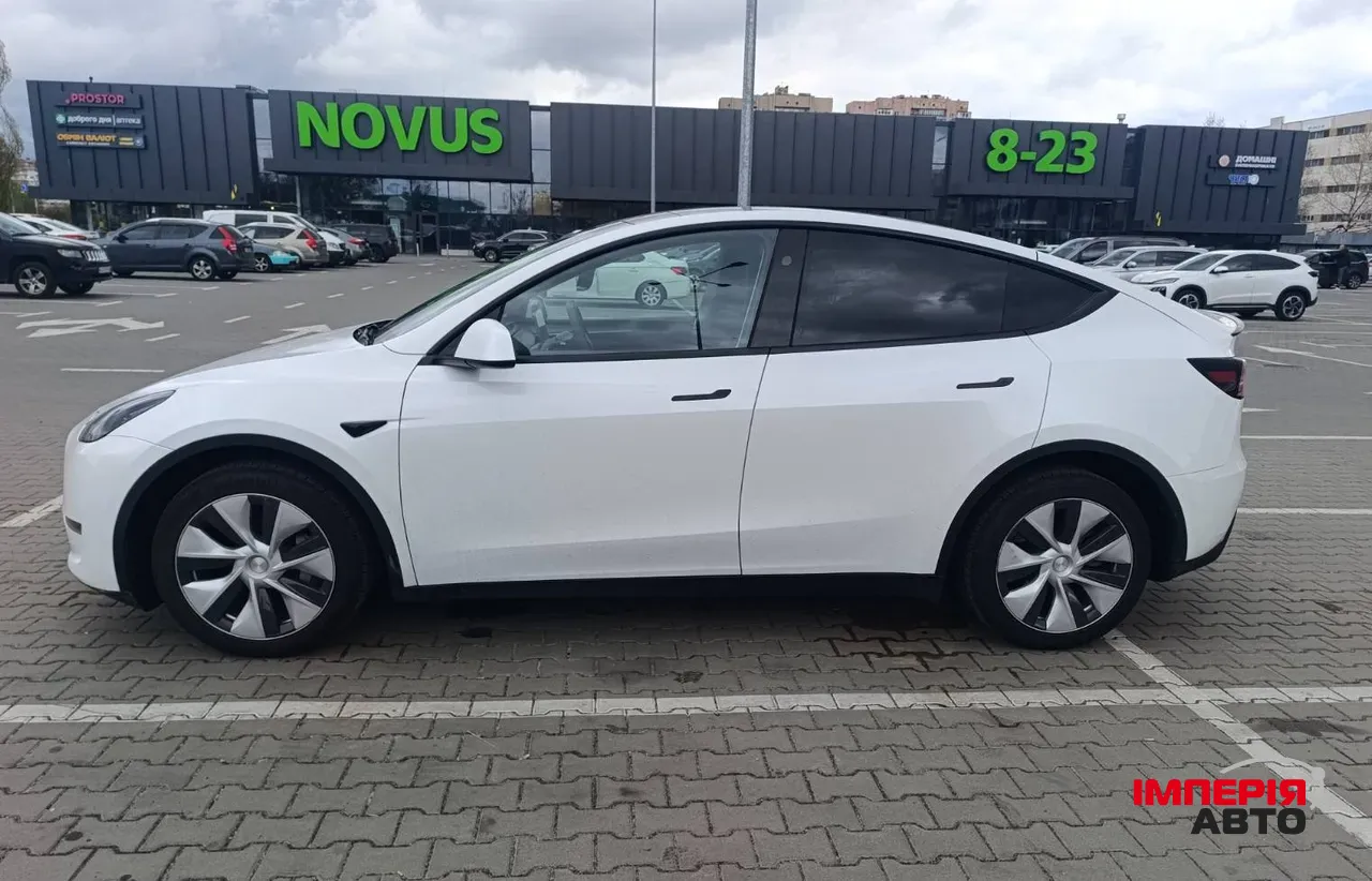 Tesla Model Y - фото 16