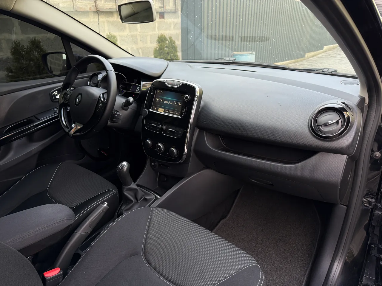 Renault Clio - фото 19