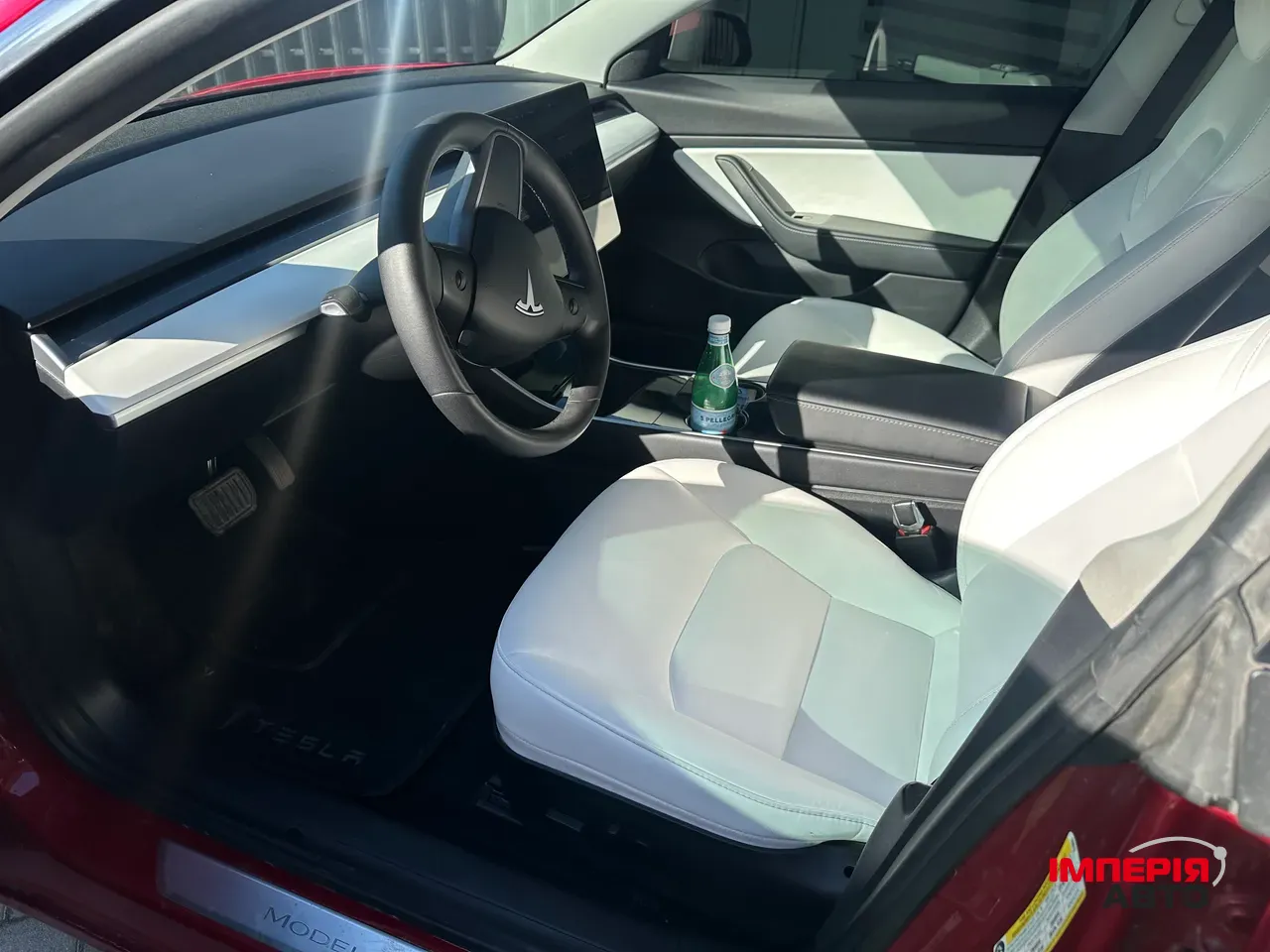 Tesla Model 3 - фото 11