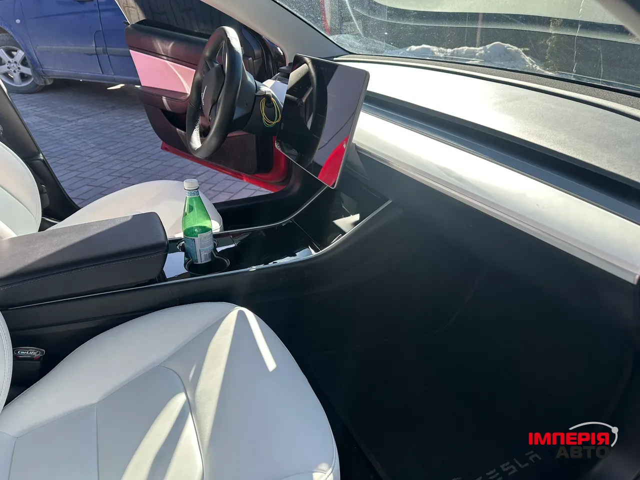 Tesla Model 3 - фото 12