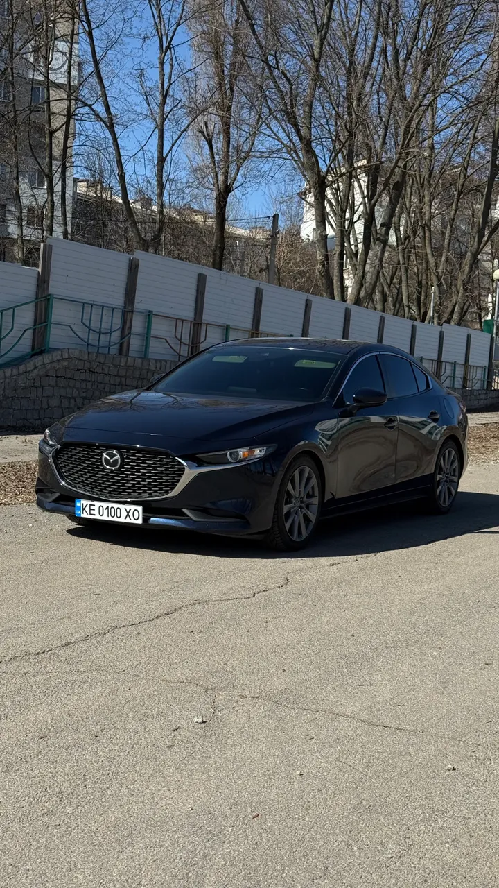 Mazda 3 - фото 2