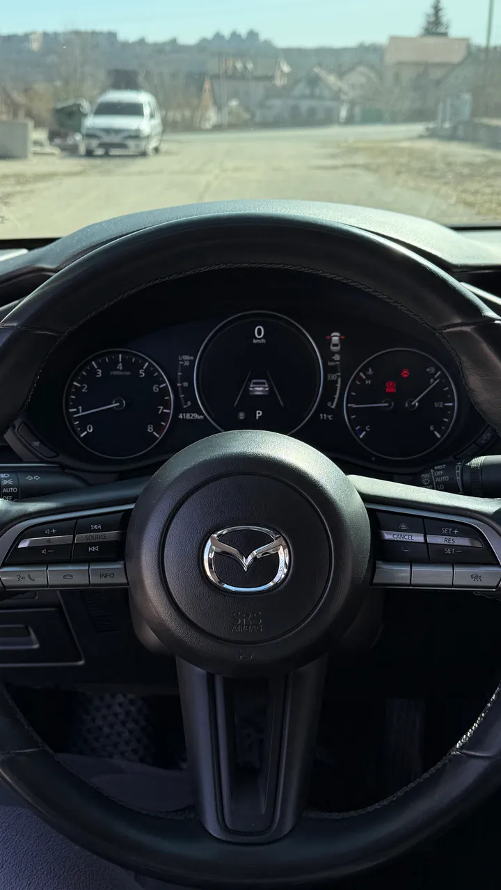 Mazda 3 - фото 12