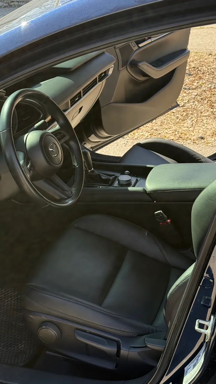 Mazda 3 - фото 11