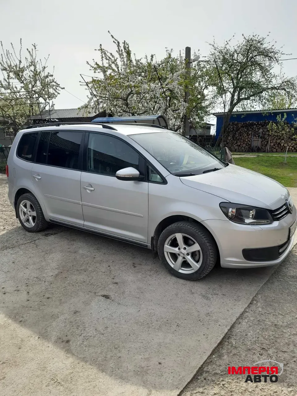 Volkswagen Touran - фото 1