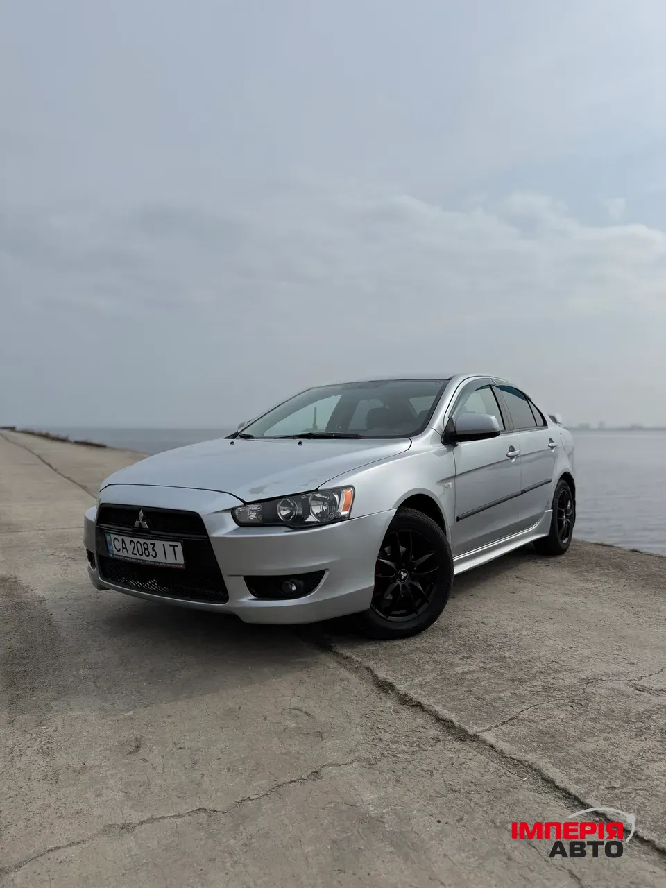 Mitsubishi Lancer - фото 1