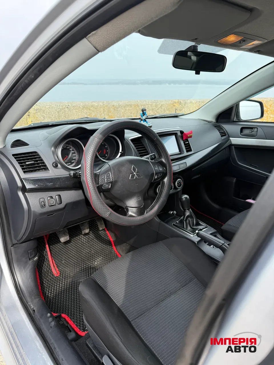 Mitsubishi Lancer - фото 8