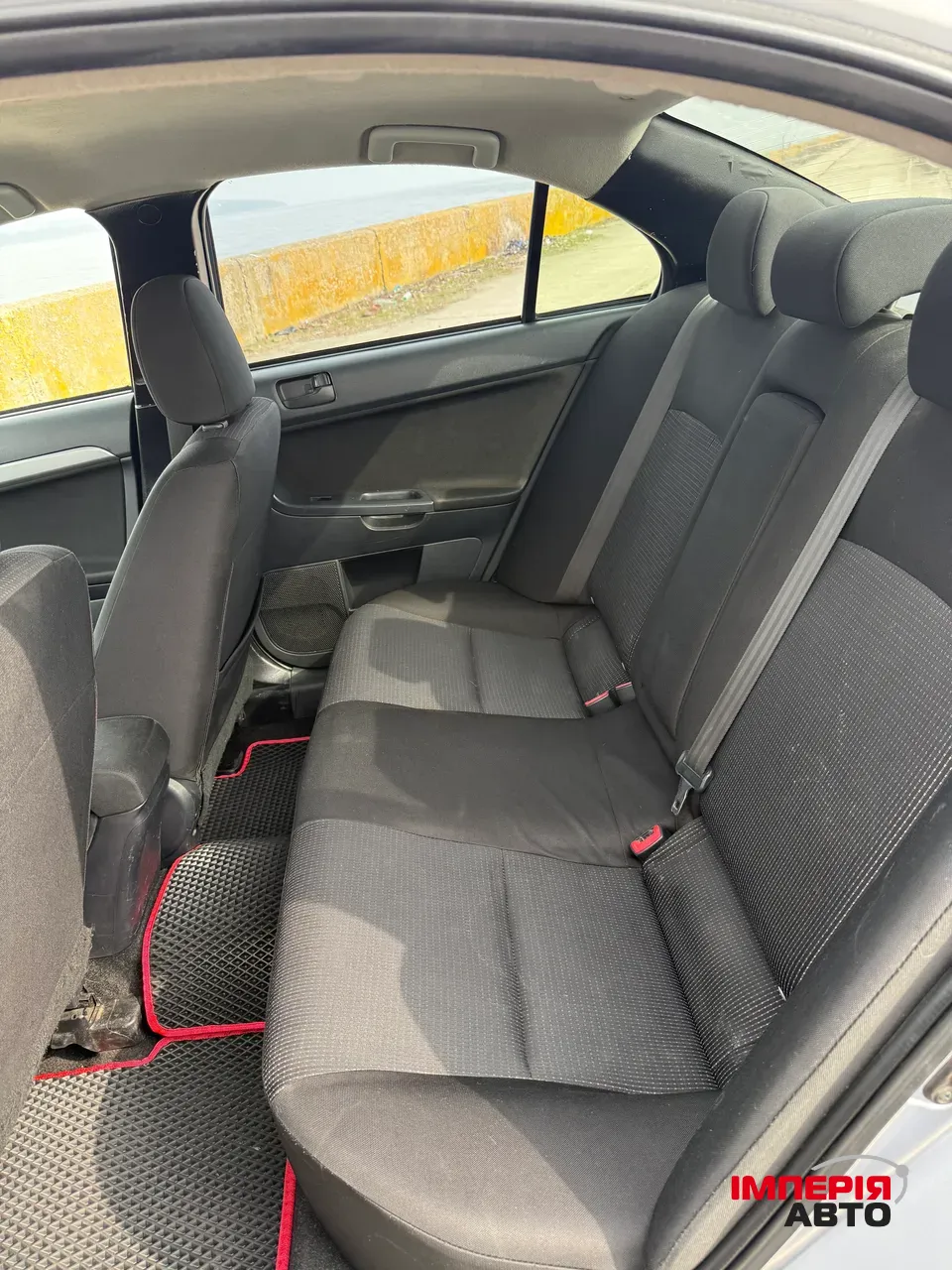 Mitsubishi Lancer - фото 12