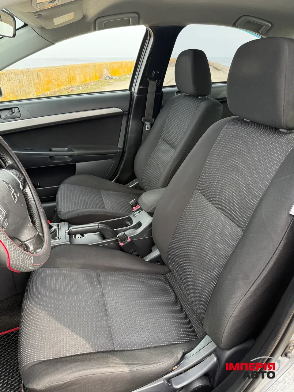 Mitsubishi Lancer - фото 9