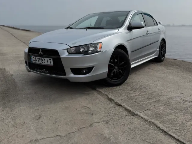 Mitsubishi Lancer - фото 1