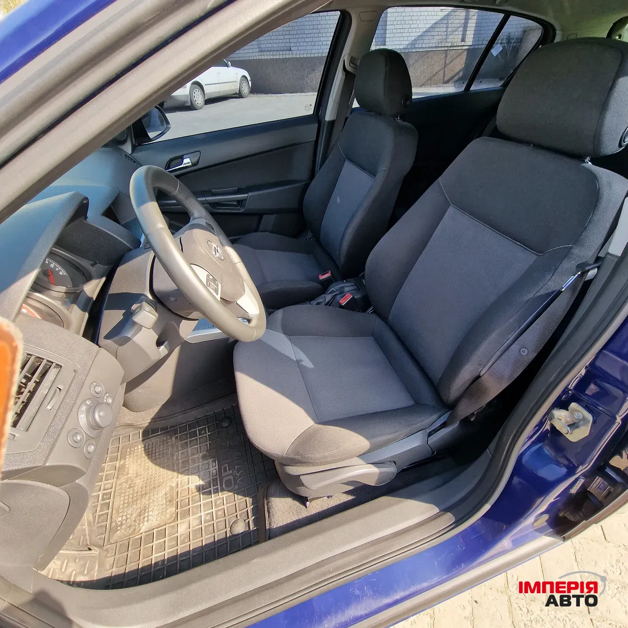 Opel Astra - фото 16