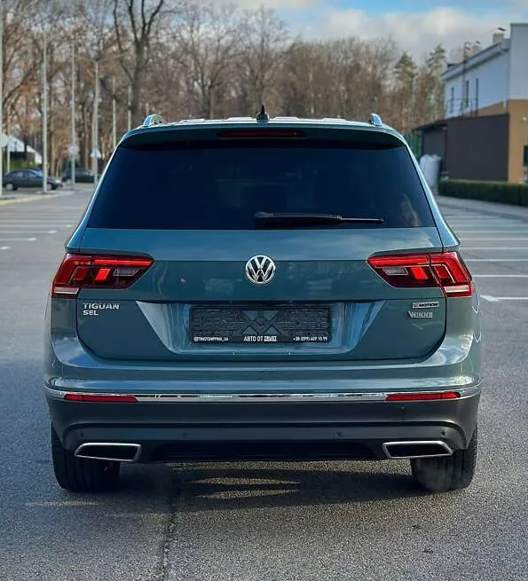 Volkswagen Tiguan - фото 5