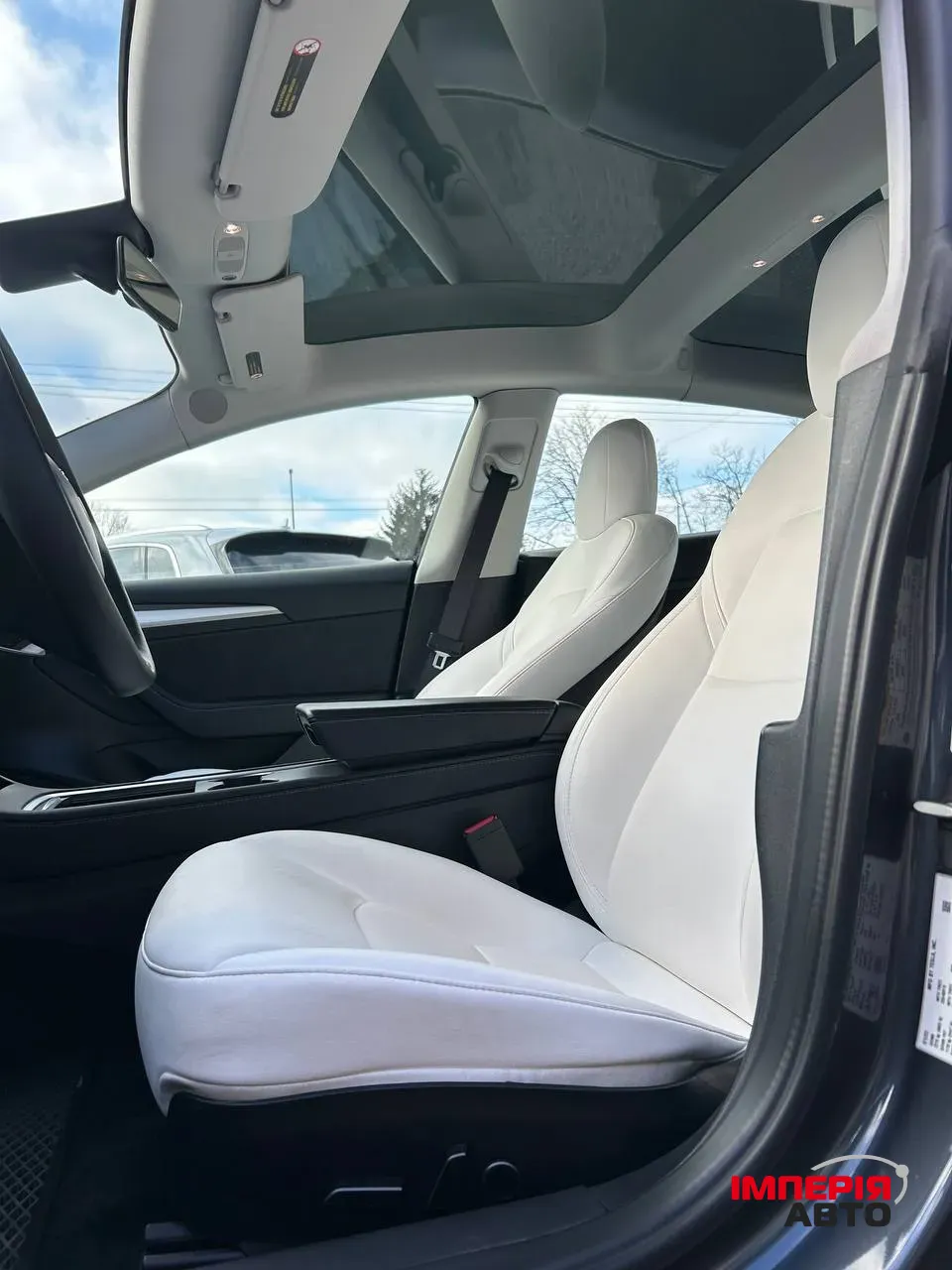 Tesla Model 3 - фото 12