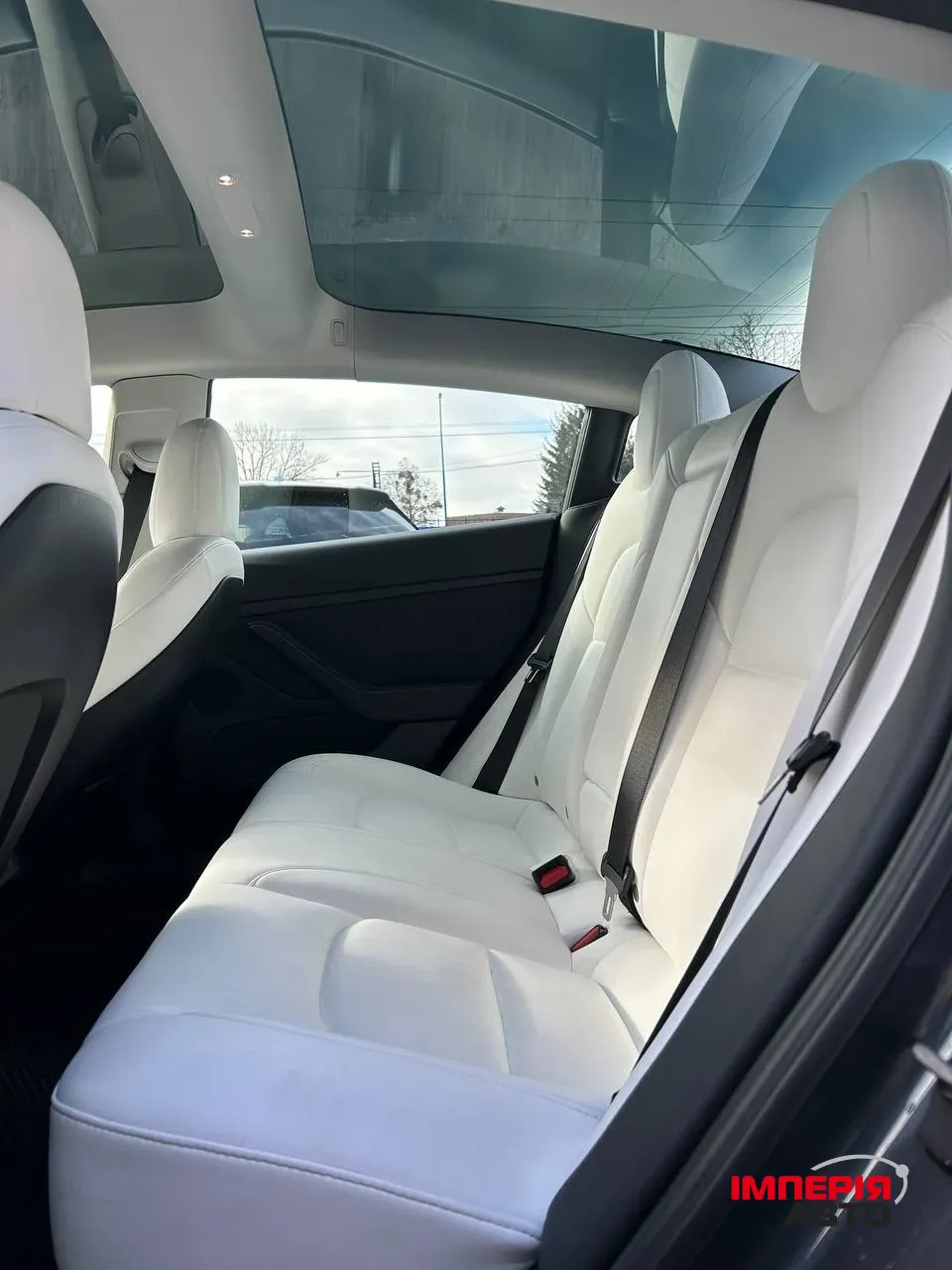 Tesla Model 3 - фото 11