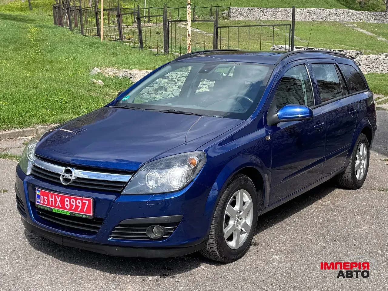 Opel Astra - фото 12