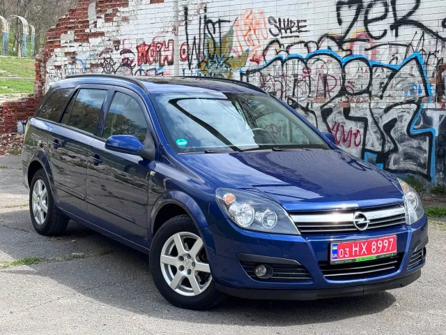 Opel Astra - фото 1