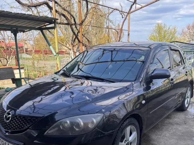 Mazda 3 - фото 5