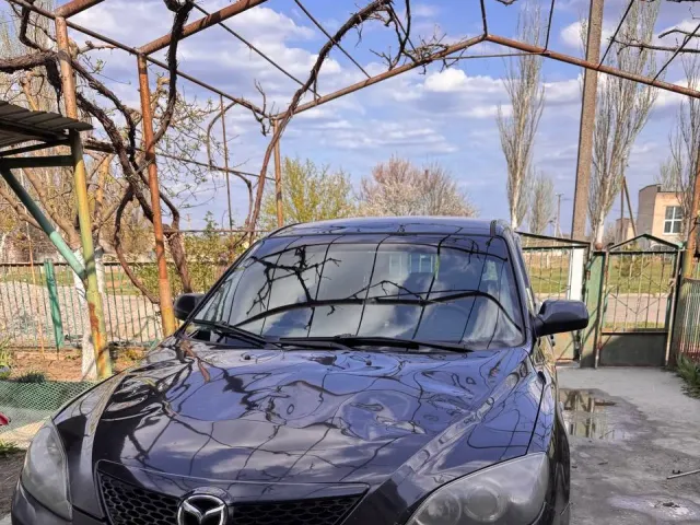 Mazda 3 - фото 1